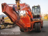 Экскаватор колёсный HITACHI ZX145W-3