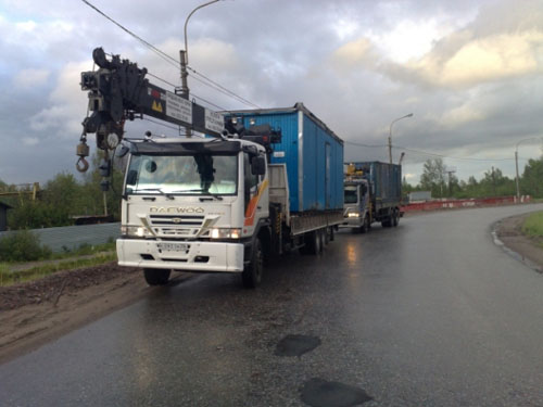 перевозка манипулятором бытовки гаража вагончика стройматериалов