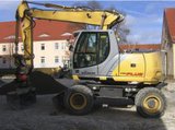Колесный экскаватор New Holland MH Plus