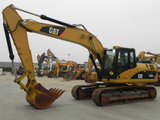 Экскаватор Caterpillar 323 DLN