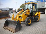 Экскаватор-погрузчик марка JCB модель 2CX